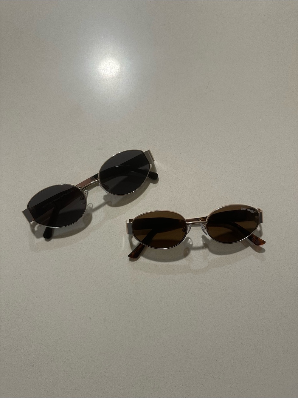 Steve Madden Women's Oval Sunglasses in Black and Brown